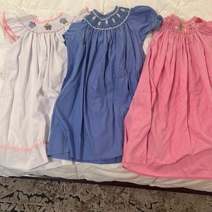 3 smocked dresses all size 3/3T.